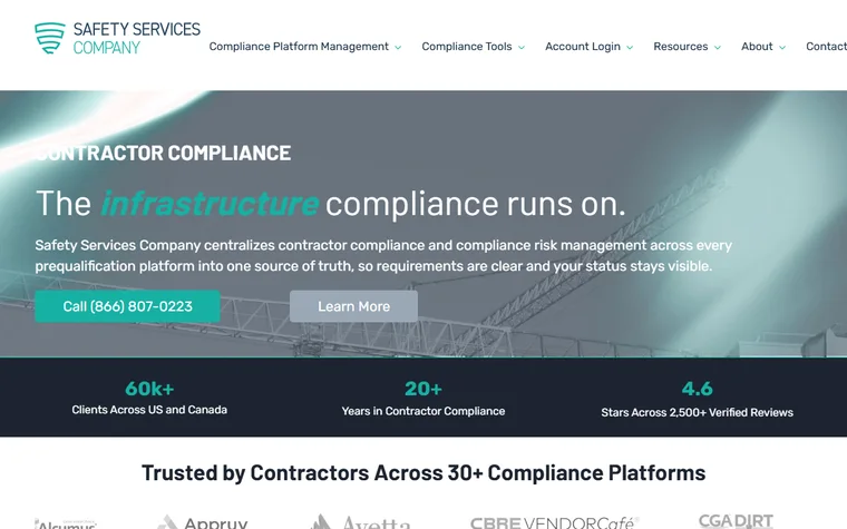Safety Services Company homepage: logo, navigation and a contractor-compliance headline over a photo of construction cranes